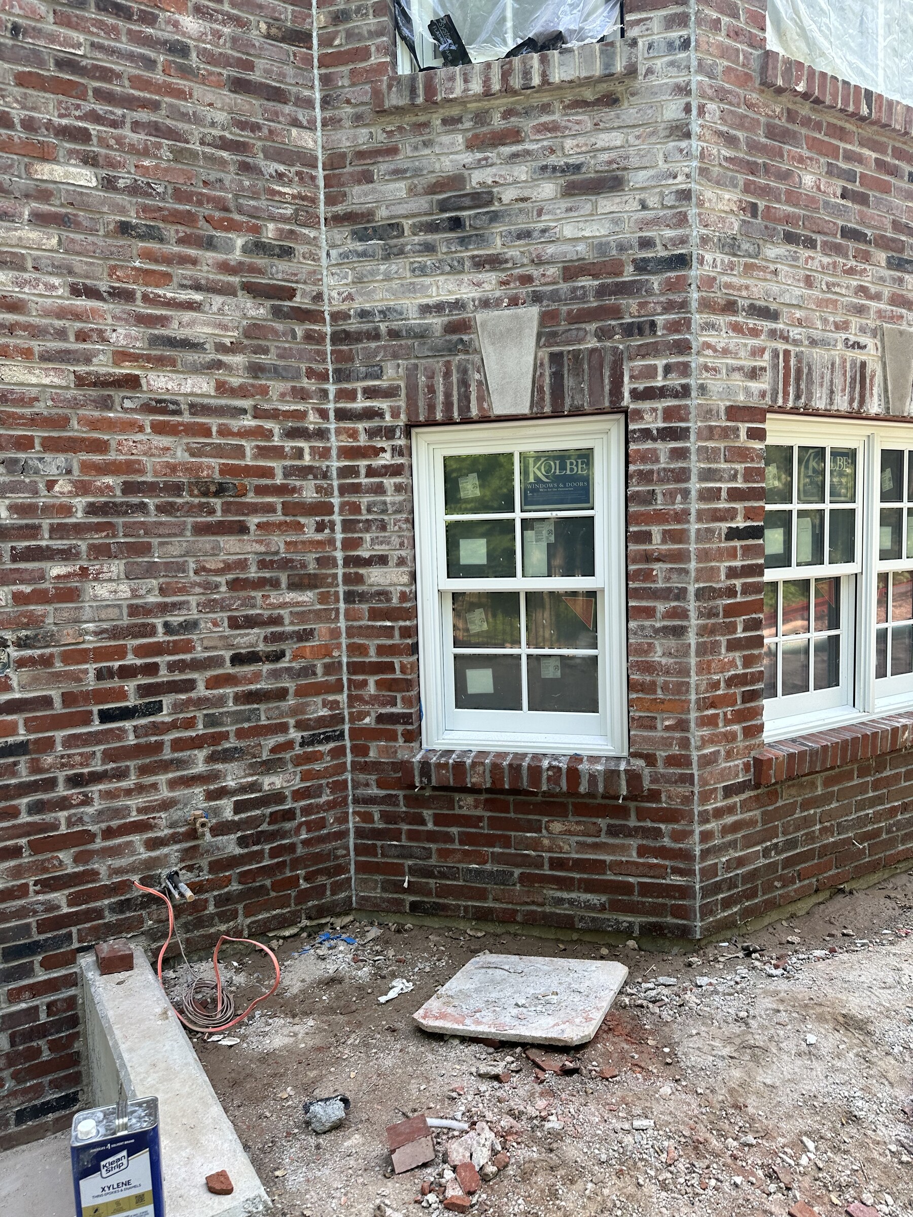Brick joint restoration around historic windows