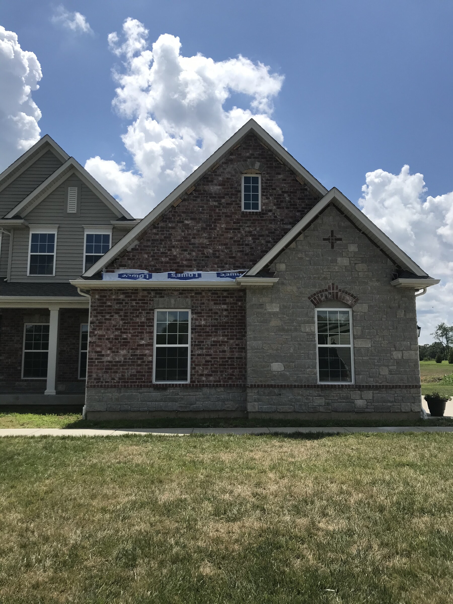 Residential brick and stone masonry home