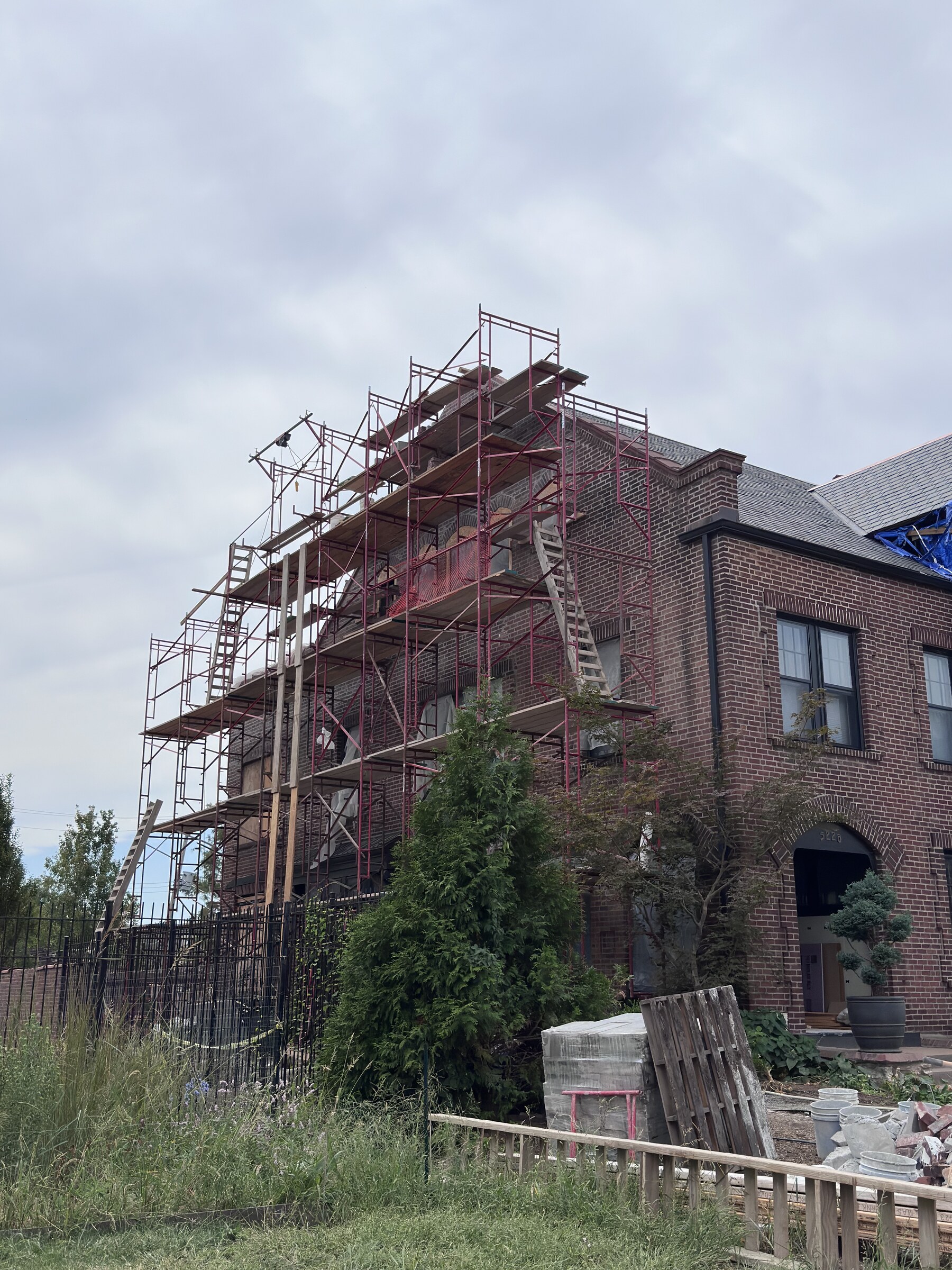 Brick restoration project prepared for mortar joint repair